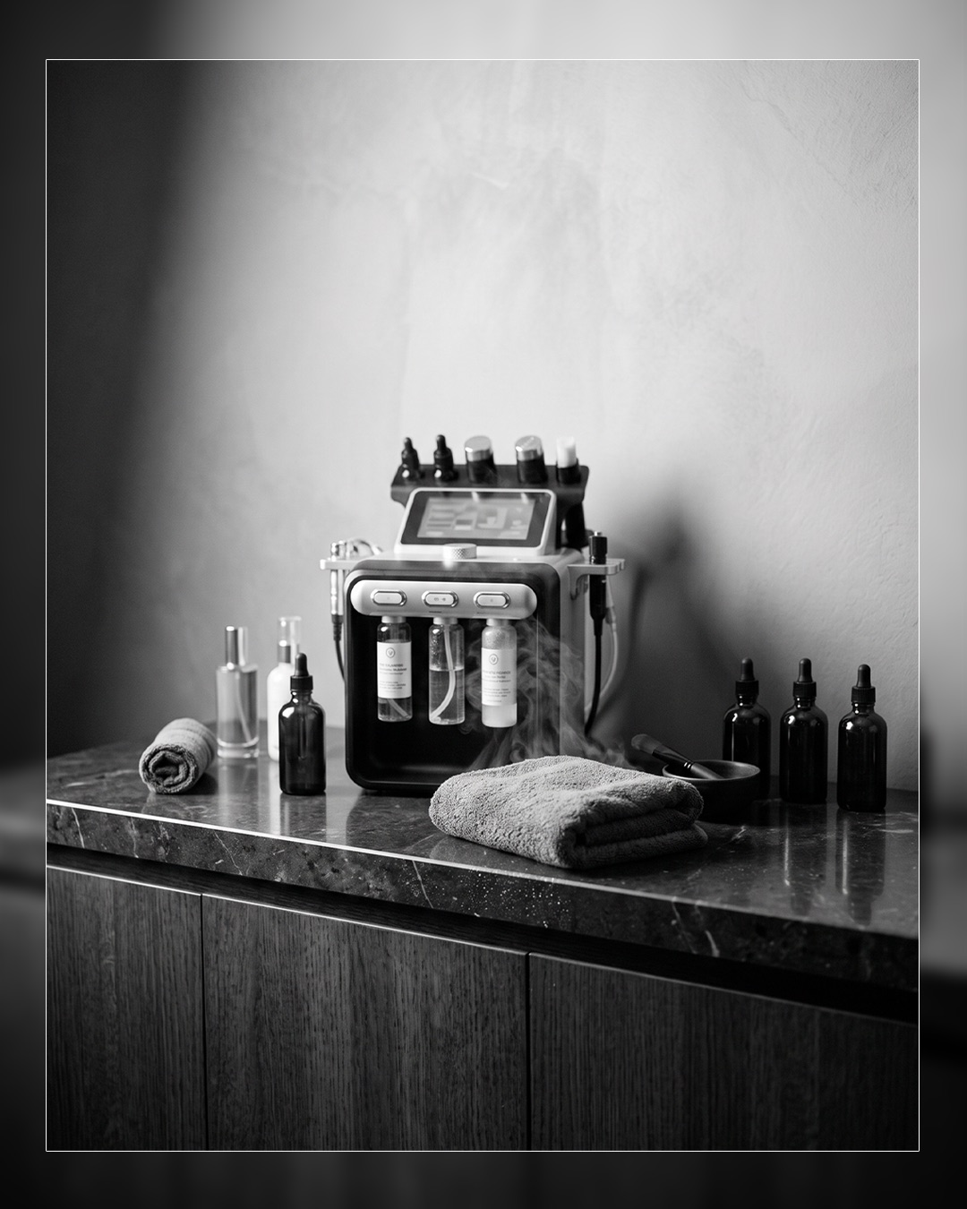 The Hydrafacial console and skincare products set up for treatment at HK Salon For Men